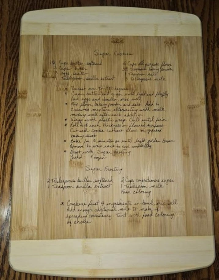 Custom engraved cutting board featuring a handwritten family recipe preserved through laser engraving.