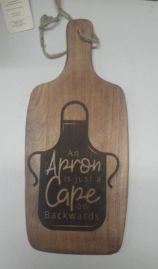 “An Apron Is Just a Cape on Backwards” Engraved Cutting Board